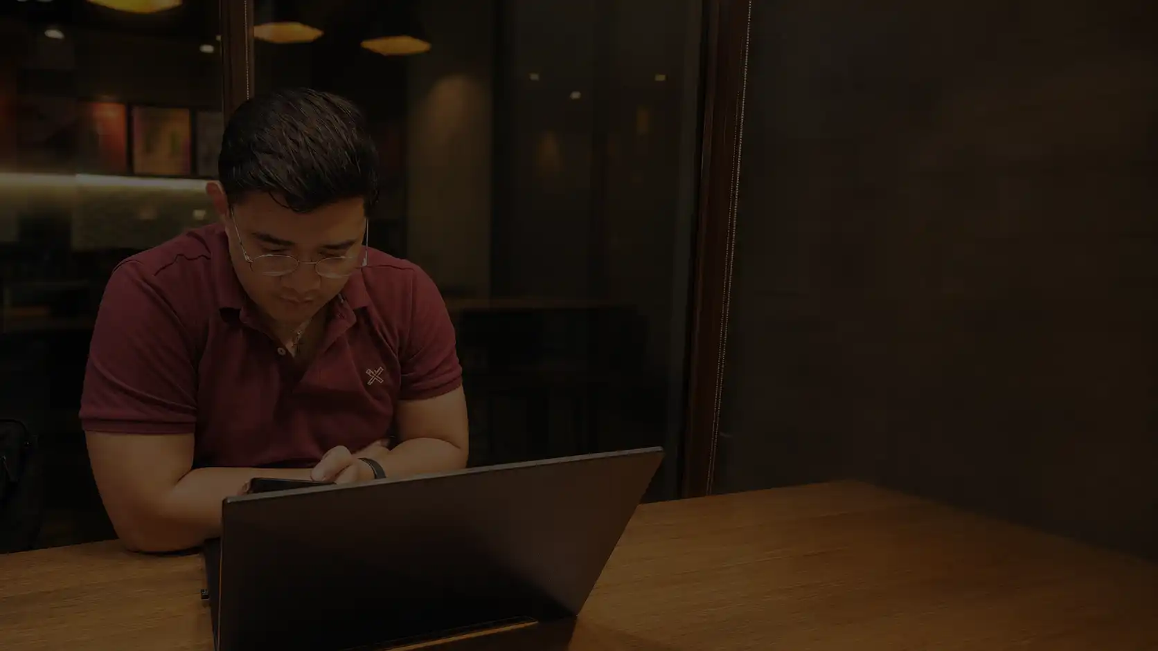 Ron working at a cafe